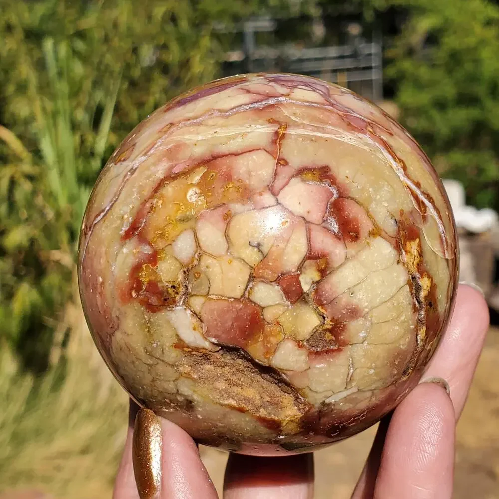 Pink Ocean Ibis Jasper Brecciated Sphere w/ Caves Druzy 458 grams 71mm